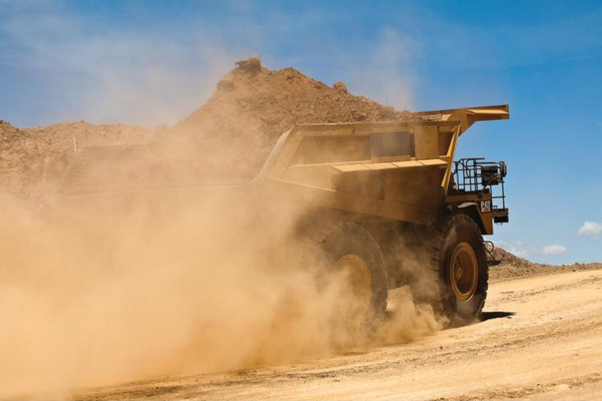 Construction site road untreated with eco-friendly dust suppression products